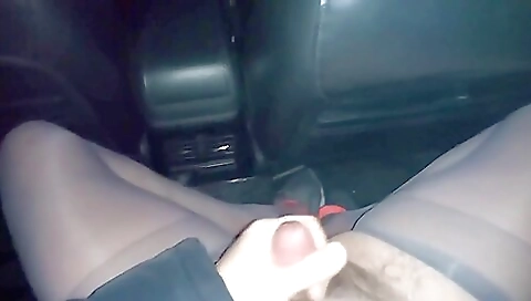 Car masturbation of a babe with sexy black stockings