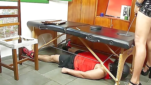 A gorgeous teen with a big ass licks a nice latex dress