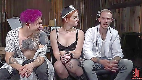 Two ladies double penetrate a male client in the face